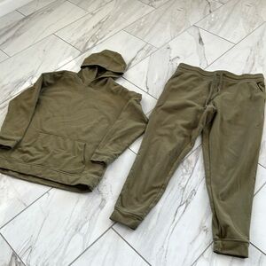 Olive green hooded sweatshirt and matching sweatpants.